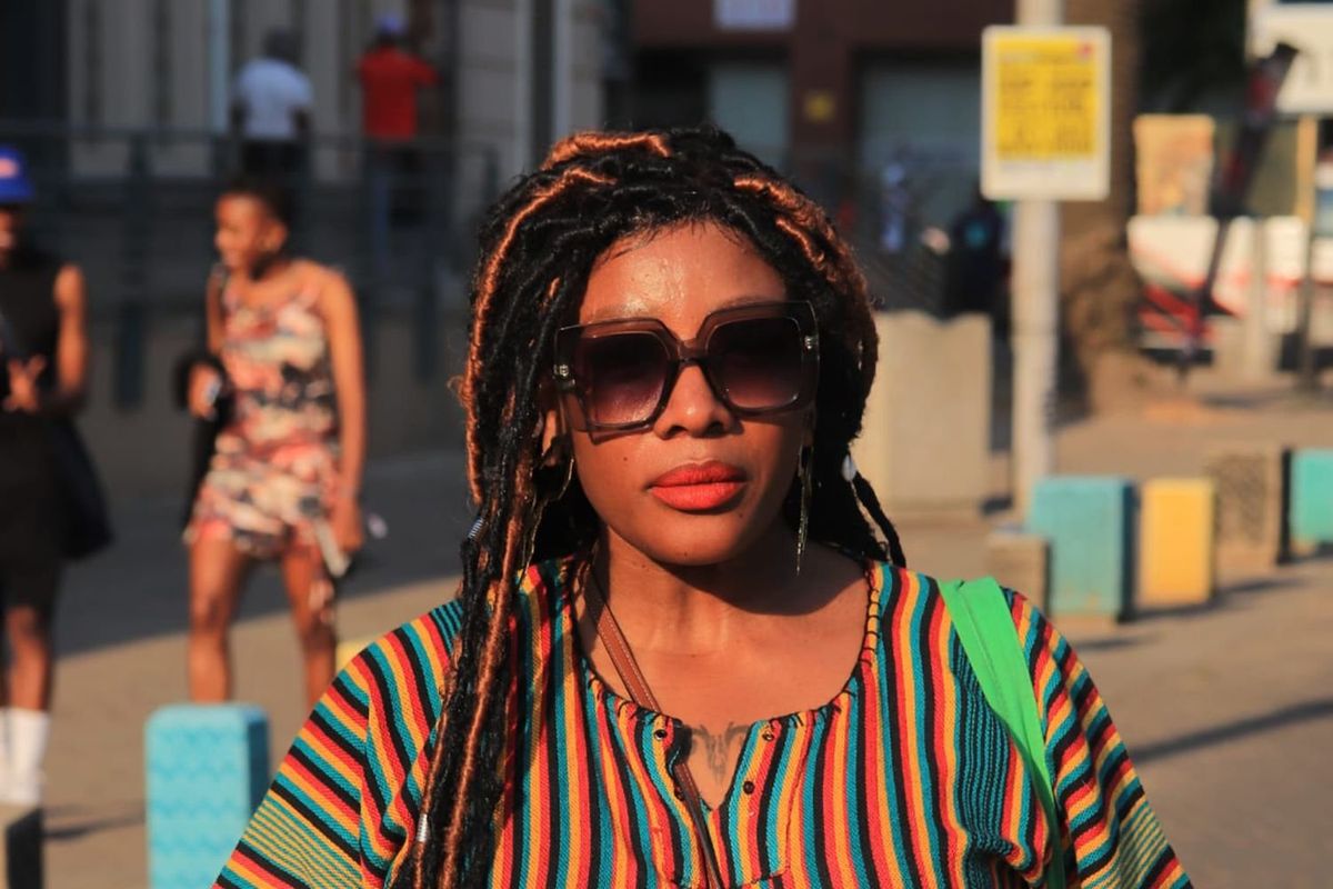 Fikile Shiba Makhalemele poses for the camera wearing shades.