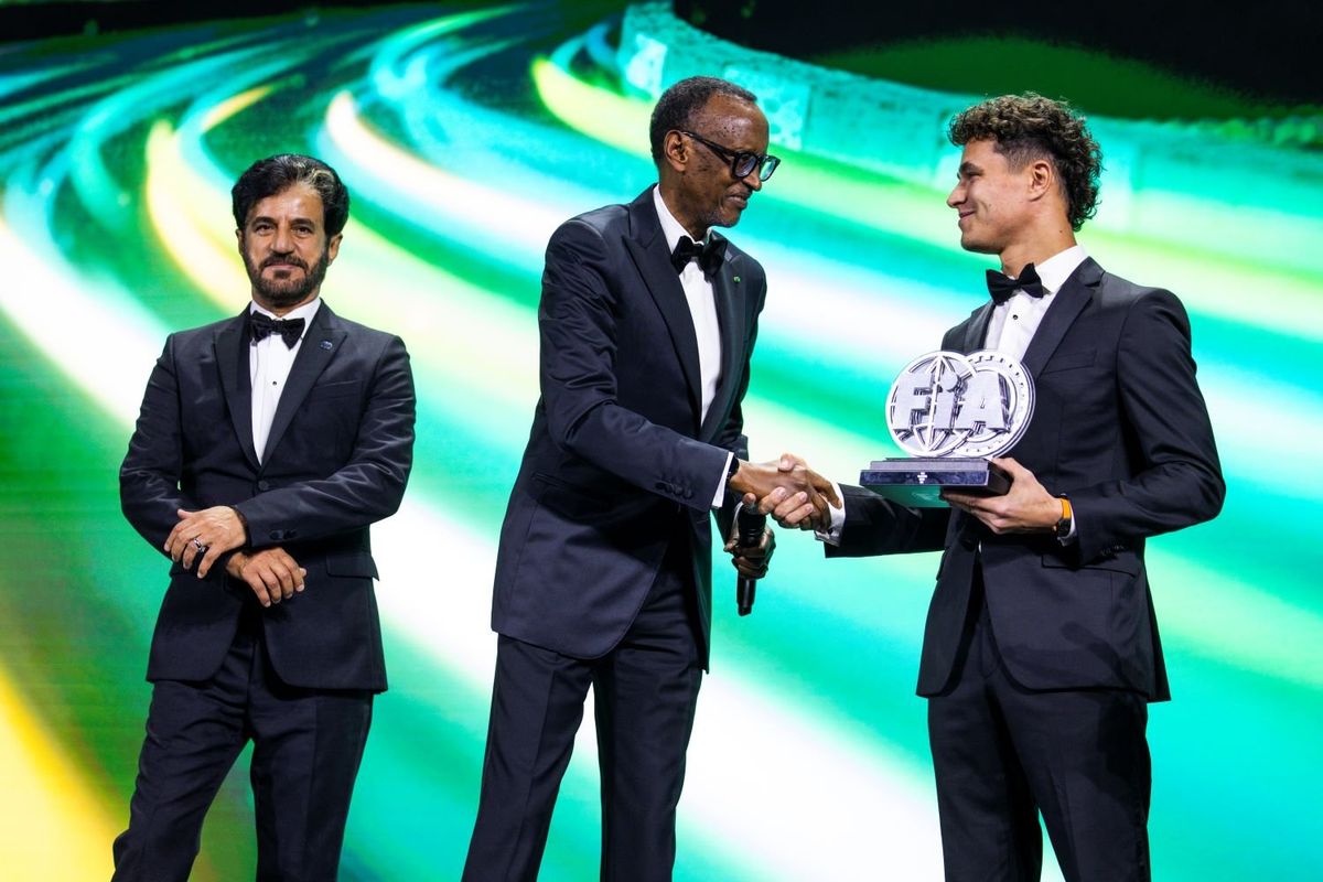 In this handout provided by Federation Internationale de l'Automobile (FIA), Lando Norris of Great Britain and McLaren receives the F1 2nd position award during the FIA Awards 2024 on December 13, 2024 in Kigali, Rwanda.