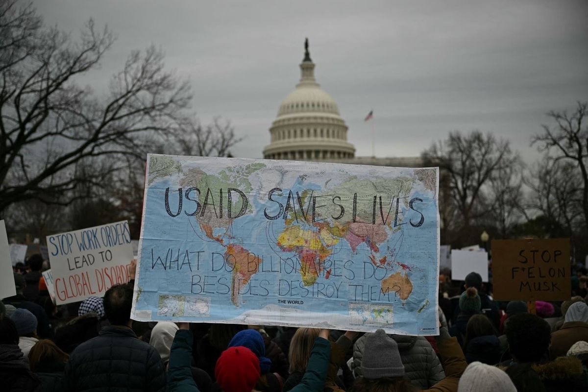 People protest against US President Donald Trump and Elon Musk's plan to shutdown USAID outside the US Capitol
