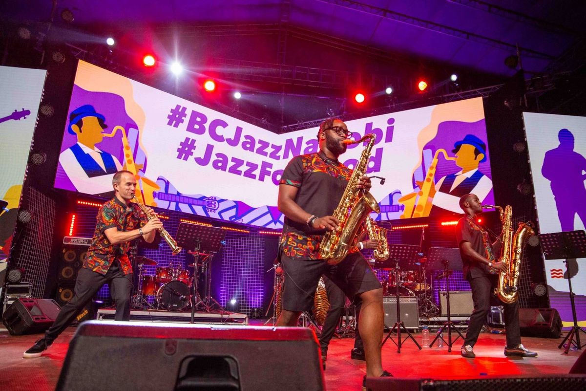 Saxophonists and a clarinetist perform on stage at the Bob Collymore International Jazz Festival