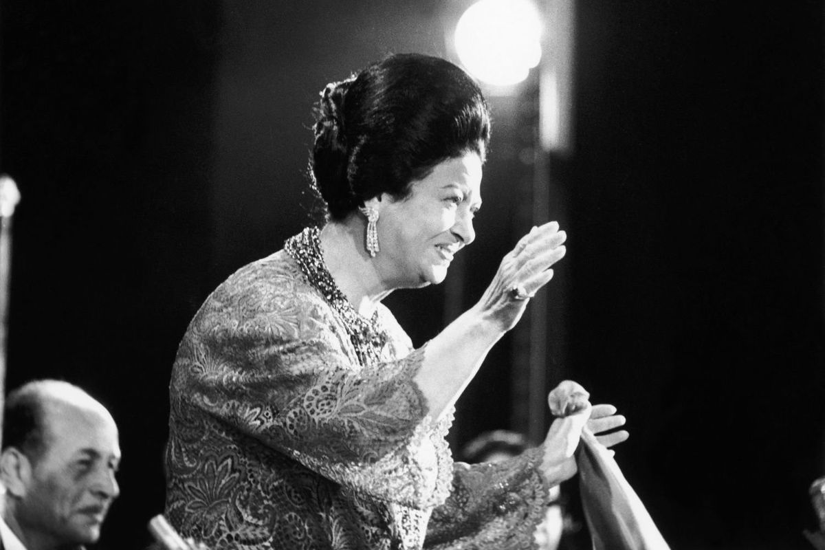 ​The Egyptian singer Umm Kulthum greeting her public during her concert at The Olympia, on Nov.14, 1967.