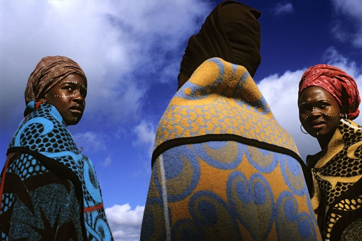 Unidentified Lesotho women dressed in traditional clothing attend a royal wedding on February 16, 2000 in Maseru, the capital of Lesotho. 